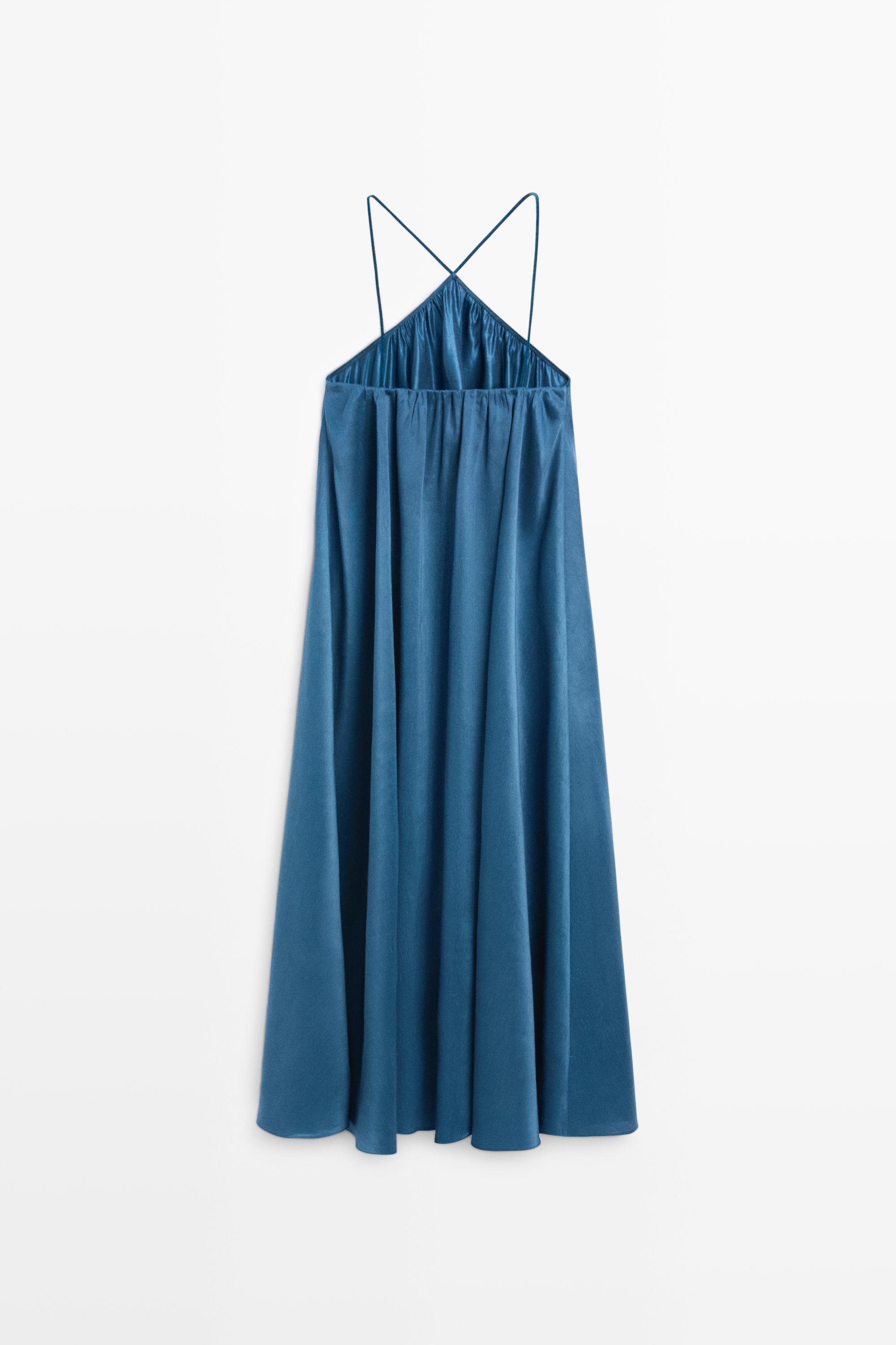 Long flowing dress with criss-cross straps